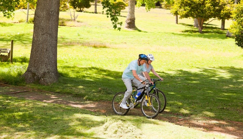 two people riding a bike